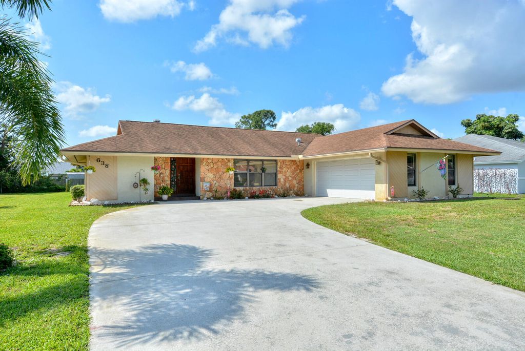 Photo of 638 SE Walters Terrace, Port Saint Lucie, FL 34983 (MLS # R10790542)