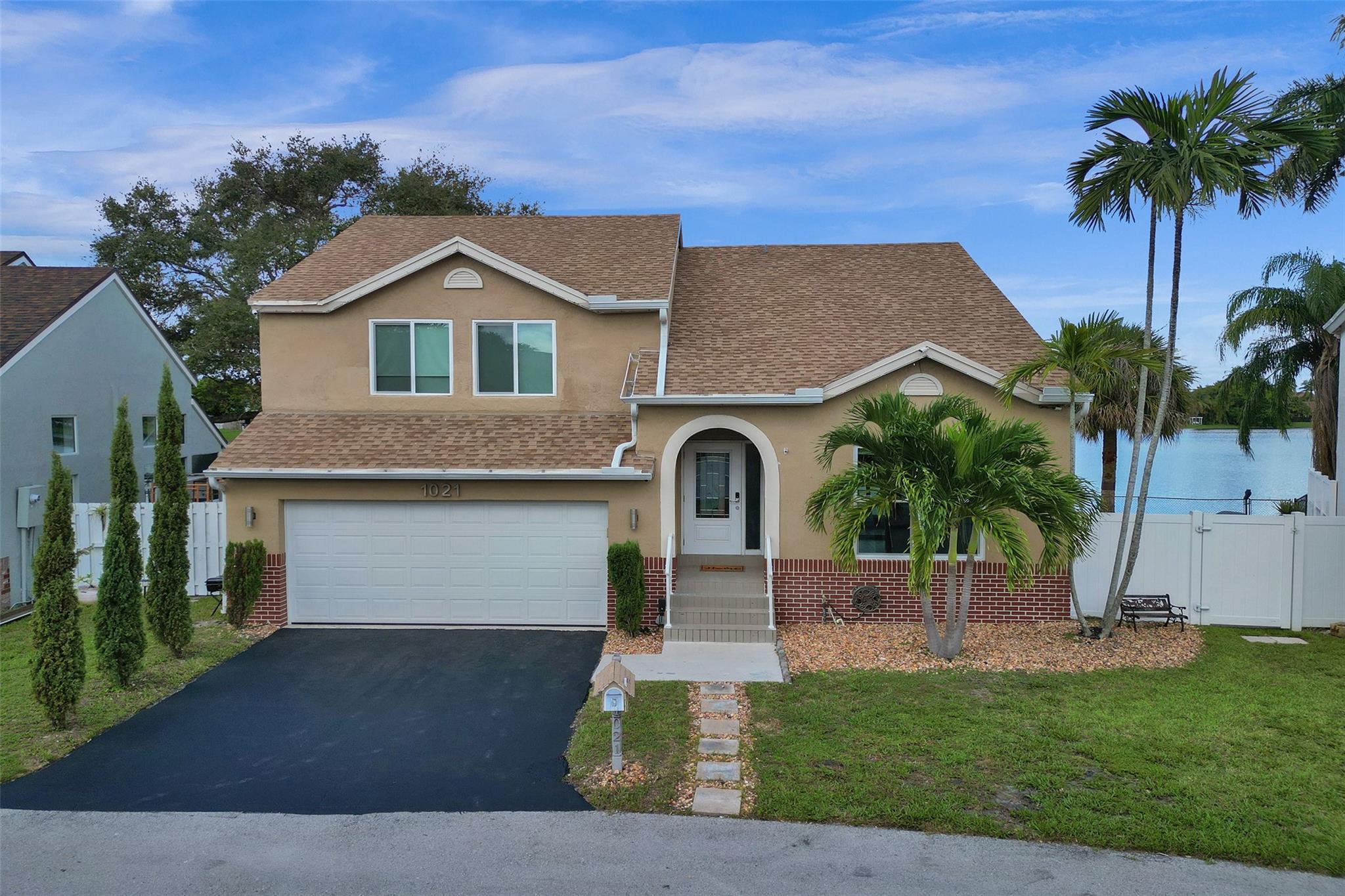Move-In ready lakefront home with private pool & modern luxury upgrades. 3BR + loft (convertible to 4th BR), 2.5 bath home with beautiful sunset views. Updated kitchen with quartz counters & stainless steel appliances. Spa-inspired baths with smart features. Freshly painted interior, whole-home water purification & smart tech including Nest, Ring, Moen Flo smart water monitor & security cameras. Major 2019 upgrades: roof, gutters, impact windows/sliders, garage door, screened patio, entire home exterior paint & water heater. A/C - 2014. Pool pump 2024 & pool cleaner 2025. 2-car garage w/ custom built storage, vinyl fencing (2024) & large backyard shed. Investor friendly can rent immediately. Pet-friendly community, low HOA w/ clubhouse, pool, hot tub, tennis, basketball and playground.