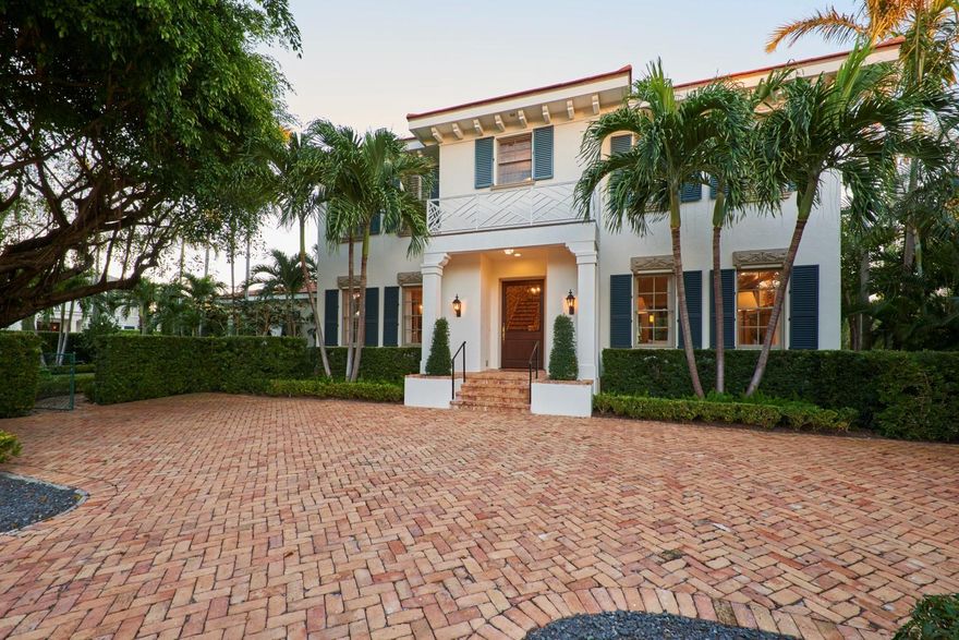 Beautiful North End Colonial home on oversized corner lot. 4BR/5.2BA, library, fireplaces, wine room, elevator, den, 2 car garage, and morning room with wet bar. Grand master suite with dual baths and closets opens onto large balcony. Gorgeous tropical outdoor areas with covered loggia, summer kitchen, terrace, and pool.