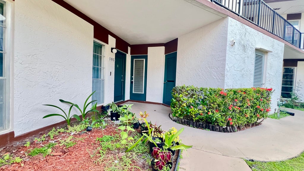 Photo of 7 Greenway Village N #105, Royal Palm Beach, FL 33411 (MLS # B26036020)