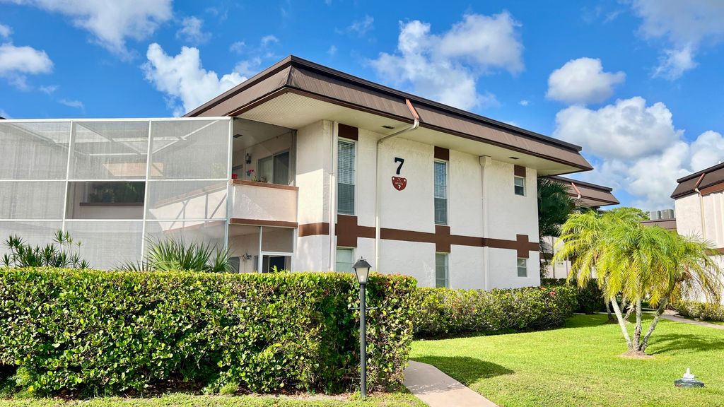 Photo of 7 Greenway Village N #105, Royal Palm Beach, FL 33411 (MLS # B26036020)