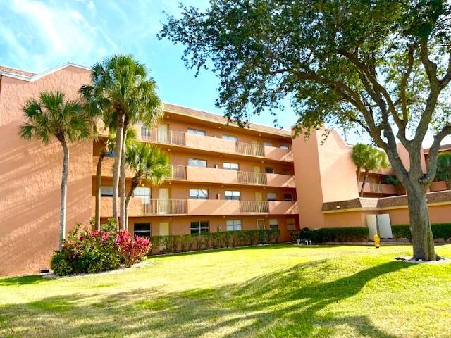 Spacious third floor condo in great Sunrise location! 2 bedroom, 2 full bathroom split floor plan with tile floors throughout. Eat in kitchen, roomy living area and screened balcony. Elevator in building and laundry room on each floor. Great price on this 1000 sq ft unit, available for a July 1st move in. All ages, convenient to highways, restaurants and shopping. Small pet ok