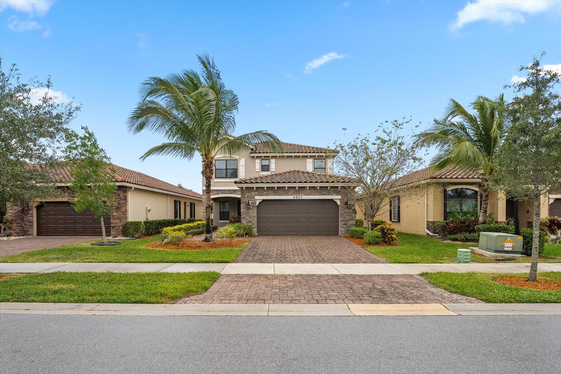 Welcome to this stunning 5-bedroom, 3-bathroom home located in the gated community of Gulfstream! Featuring stainless steel appliances, a picturesque Long Lake view, and an open floor plan, this home is perfect for both relaxation and entertaining. With one bedroom and a full bathroom conveniently situated on the first floor, this home offers both comfort and convenience. Step onto the brand new flooring that graces the second floor and stairs, adding a touch of elegance to the interior. Enjoy the great location, with close proximity to 441, Wellington Green Mall, fine dining, and shopping options. Additionally, this home offers quick access to all major local roadways. Call today for showing!