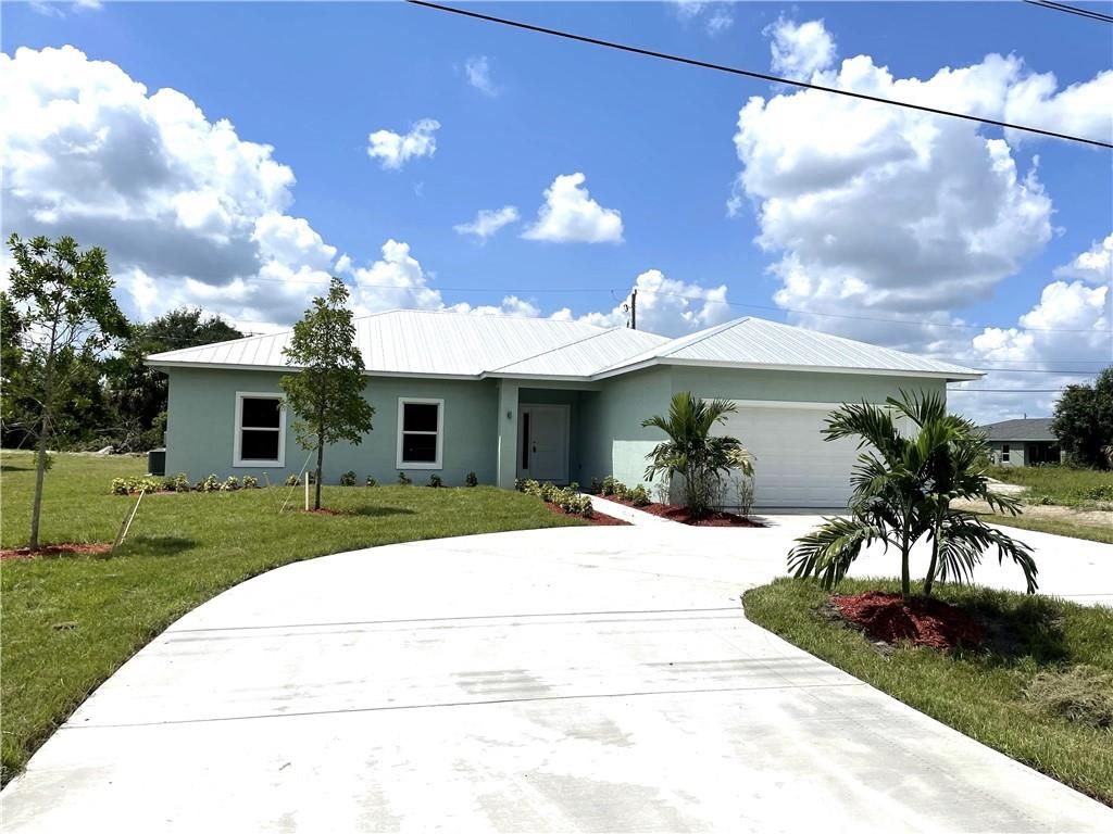 Photo of 4066 SW Port St Lucie Blvd, Port Saint Lucie, FL 34953 (MLS # F10296802)