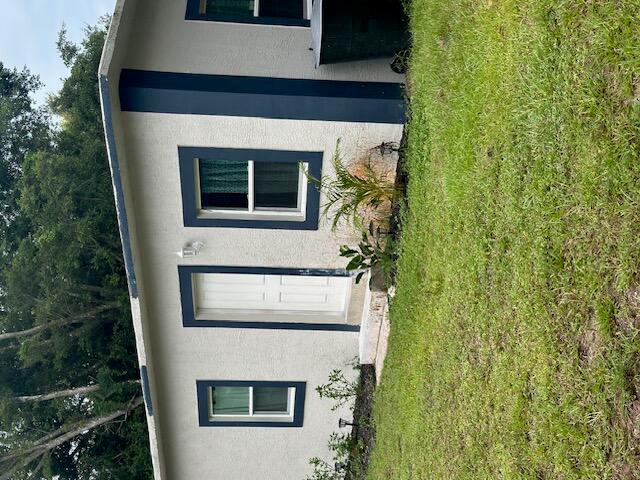 Beautiful, completely remodeled CBS apartment with full kitchen, new appliances, plenty of yard space, freshly painted, new windows and off street parking. Must see!!