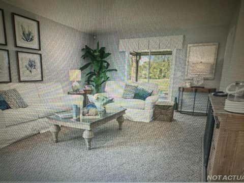 Tiny photo for 1 CADDY Court, Bunnell, FL 32110 (MLS # B26054154)