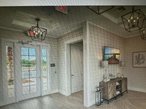 Tiny photo for 1 CADDY Court, Bunnell, FL 32110 (MLS # B26054154)
