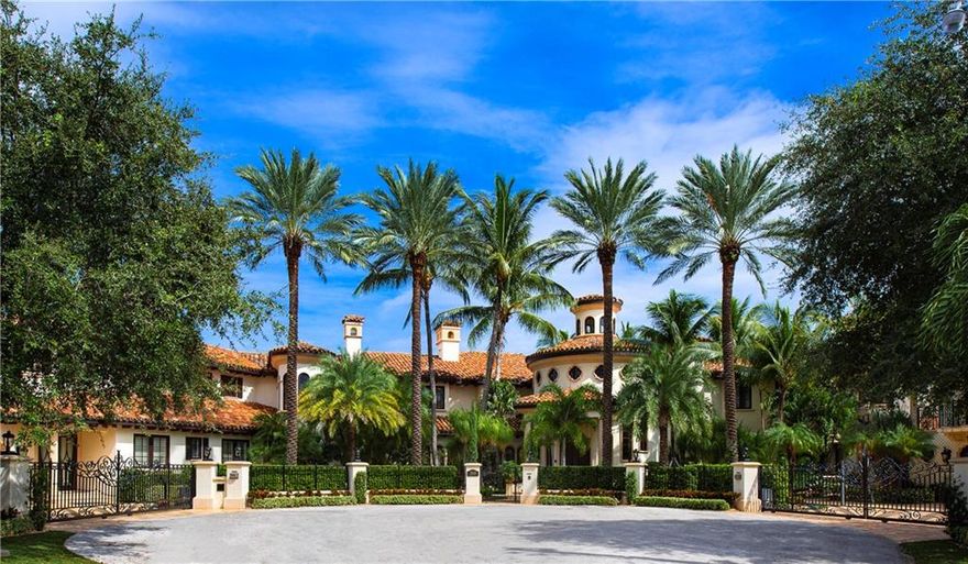 Unique Mediterranean estate. The Estate encompasses nearly 24,000 total square ft. The home sits on a little over 1 acre of property with 665 ft of waterfront. This 9 bedroom and 10 full bathroom and 6 half is uniquely designed. with separate guest quarters. Built in 2004 the home has a timeless elegance essence. As you walk the property you have the feeling that you are in a resort. magnificent landscaping, beautiful pathways to an extraordinary pool with waterside grotto and large sun shelf. Your family will enjoy the rock climbing wall and slide. Entertaining will be exciting as you have refreshments around the sunken patio bar that is built around the pool. If you are a car enthusiast you will love the 7 garage spaces. Whole house generator with natural gas feature. Bring your largest yacht. Cruise down serene water ways to the ocean. This is a must see!