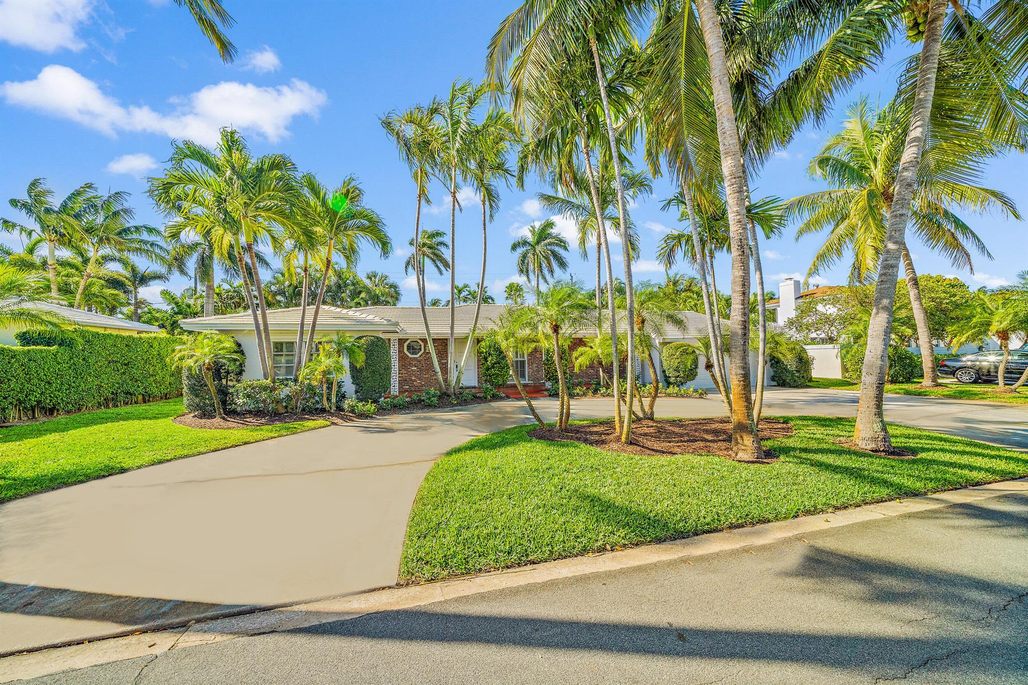Located on a quiet tree lined street in desirable SoSo, this home is just a short walk to the Intracoastal Waterway down a deeded path. A quick drive takes you to downtown West Palm Beach, I-95 or the shops and restaurants of Palm Beach. Boasting large living spaces and bedrooms with parquet floors. The kitchen suite includes a breakfast nook and an adjacent room that can be used as a home office or pantry. Closet space and storage areas abound in this house and will accommodate all your storage needs. A large covered patio spans the rear of the home and overlooks the large private lawn; a special place for outdoor entertaining close to the kitchen. Available July 2025.
