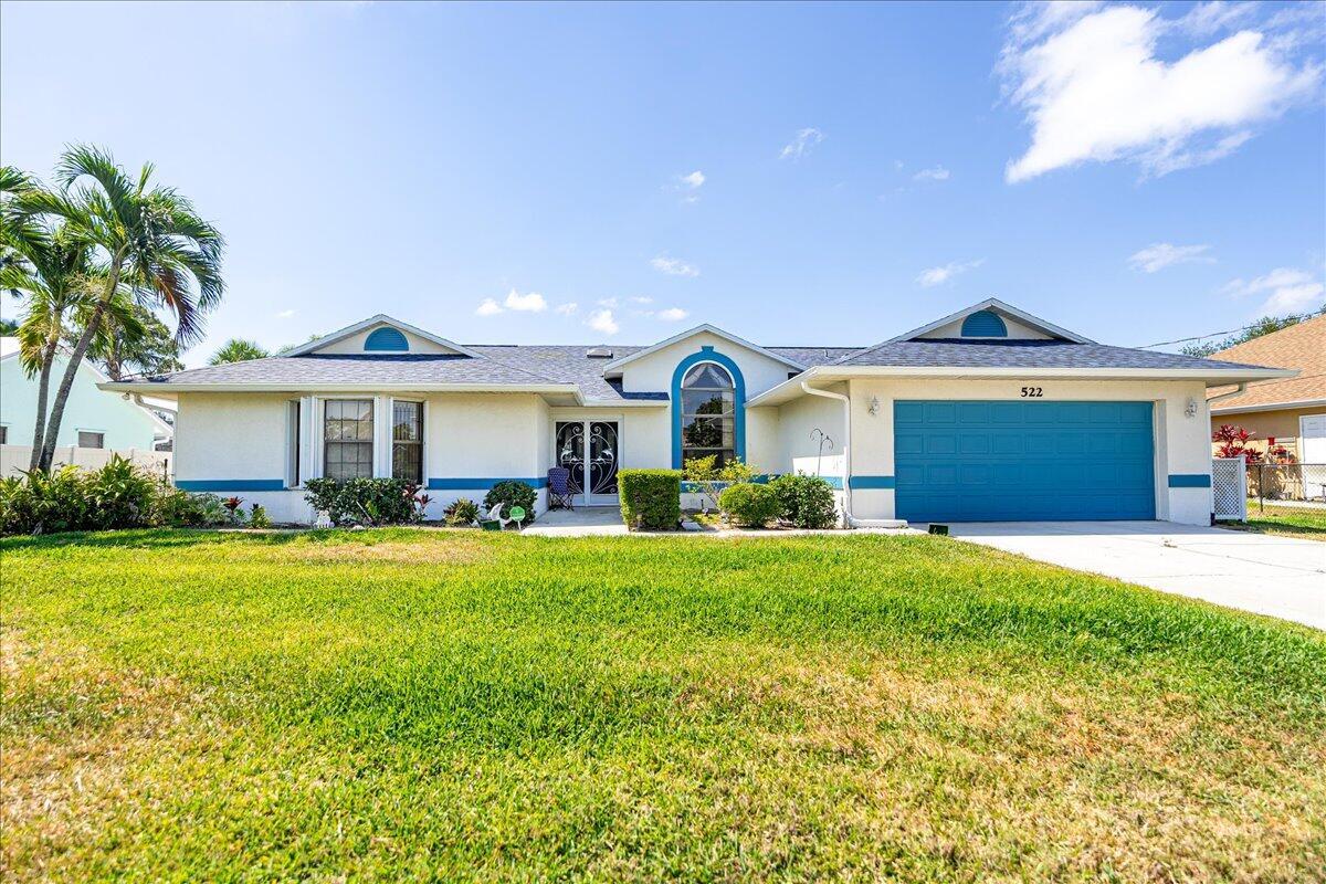 Live the Florida Lifestyle!!! This 3 bedroom, 2 bathroom 2 car garage was customized build with larger SF for this style home. Open kitchen with a large pass through to a screened in cover patio with plenty of room for a pool. The great room flows to a sliders to the patio and a formal dinning room. Master bedroom has double sinks and a separate jacuzzi tub. This split floor plan has tile throughout with the main bath a cabana bathroom. The roof '22. This home is conveniently located near Crosstown and making the commute easy to 95 or Turnpike.