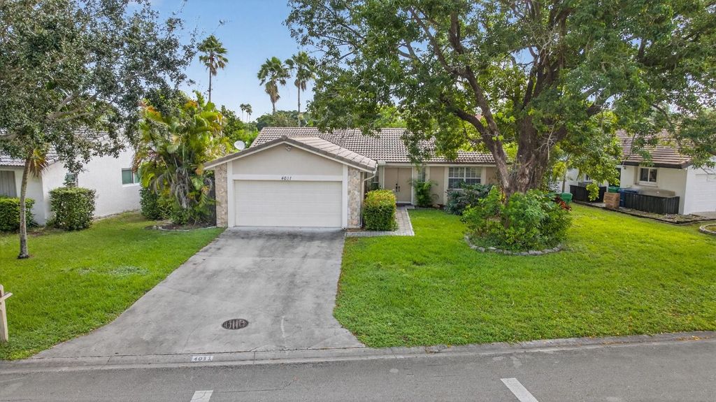Photo of 4011 NW 115th Ave, Coral Springs, FL 33065 (MLS # F10533943)