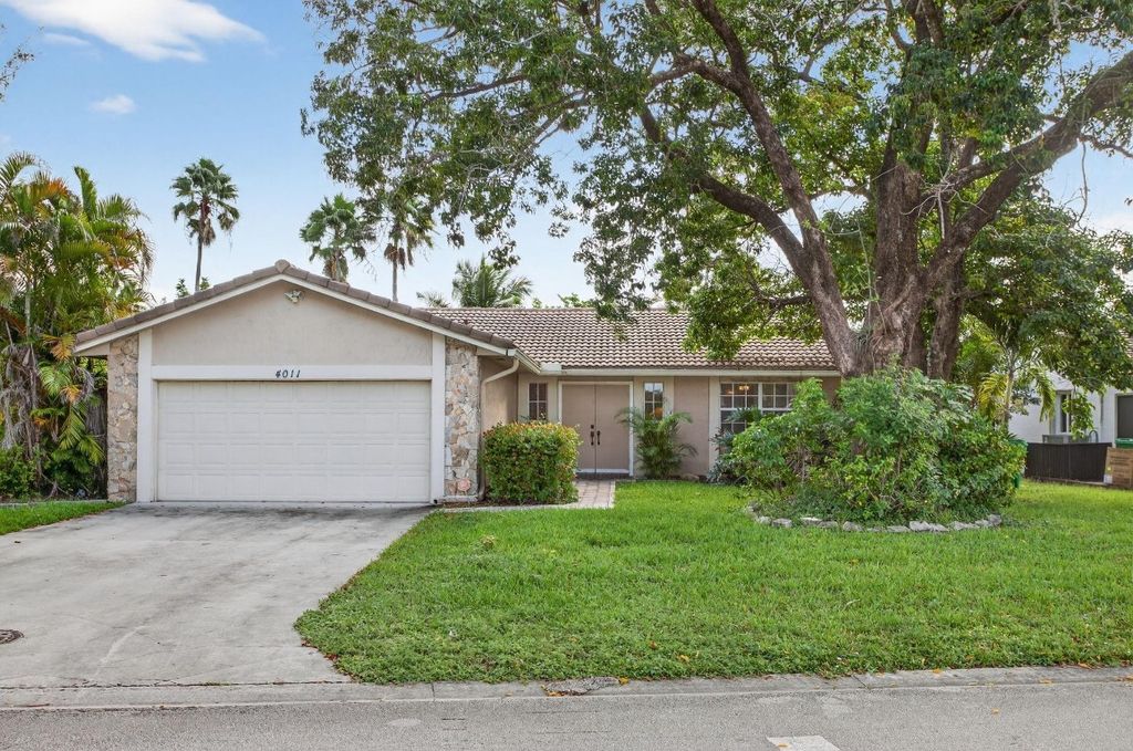 Photo of 4011 NW 115th Ave, Coral Springs, FL 33065 (MLS # F10533943)