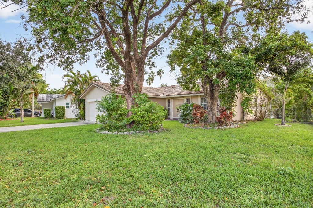 Photo of 4011 NW 115th Ave, Coral Springs, FL 33065 (MLS # F10533943)