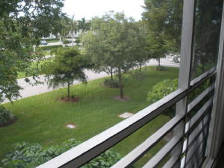 Exceptionally bright and sunny corner. Spotless move in condition. Diagonal tile to bedrooms. Patio is tiled with a closet and accordion hurricane shutters. Sold Furnished/Unfurnished.Newer A/C put in 2009.