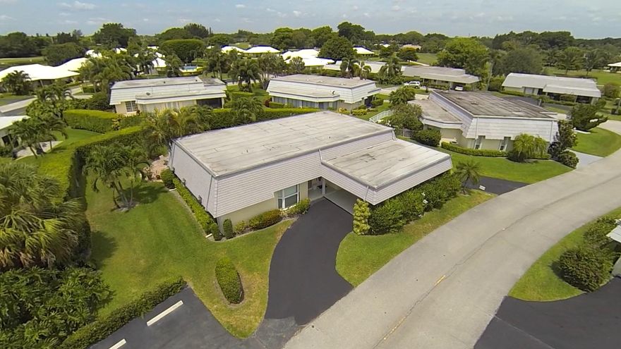 Lovely 3 bedroom, 2 bath villa sited on a large lot, hedged for the ultimate in privacy. Amenities include: Solid wood cabinetry in kitchen, new washer/dryer, new ac, 2015 roof, tile floors, screened in side patio, decorator doors, circular driveway & more.  Move in ready. The City of Atlantis is a gated, manicured country club community offering 2 championship golf courses with no membership obligations. Kintz Park at The City of Atlantis, where families and residents gather to play tennis, attend a party or City sponsored events in the Club room. Playground for kids has a covered picnic area and a water park for fun! Conveniently located close the beaches, I-95 and in between major airports.