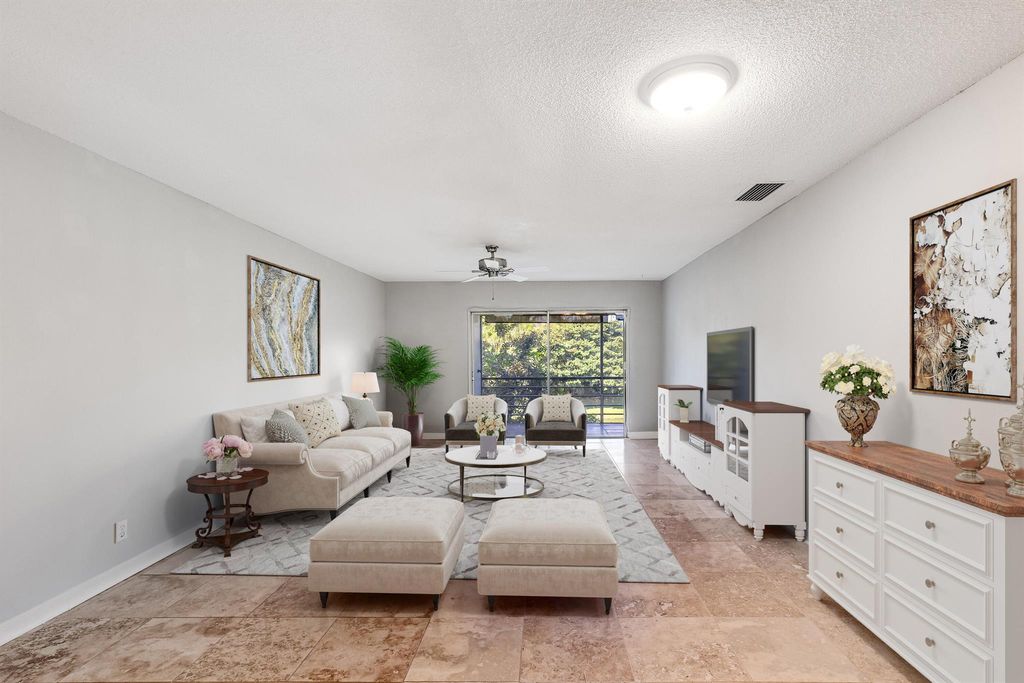 Photo of 10693 N Military Trail #8, Palm Beach Gardens, FL 33410 (MLS # R10998372)