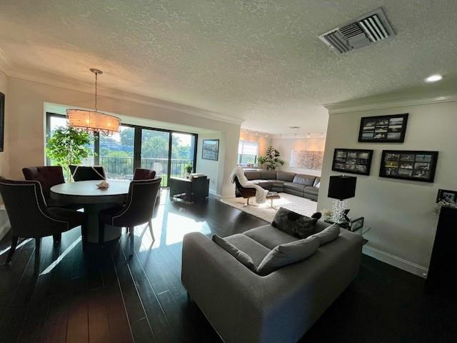 Stylist Furnished Seasonal Rental located in the gated Fountains Country Club. Large open floor plan, perfect for relaxing and entertaining. Watch the sunset from the condo, overlooking palm trees. Laundry in condo, located on the 3rd floor in an elevator building. Community has an outdoor, head pool. This was a 3 bedroom converted into a 2 bedroom.