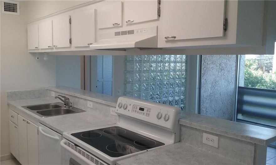 Renovated 2 bed 2 bath in well maintained  community just east of 95 2 pools small gym close to shops and 2.7 miles from beach