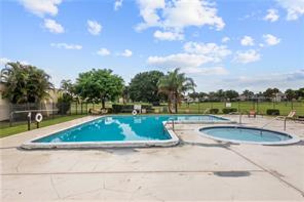 Photo of 9933 NW 65th Ct #D15, Tamarac, FL 33321 (MLS # F10307230)