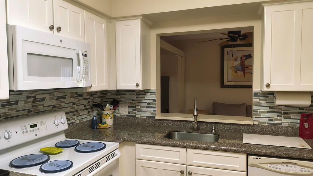 Photo of 3178 Via Poinciana #102, Lake Worth, FL 33467 (MLS # R11145822)