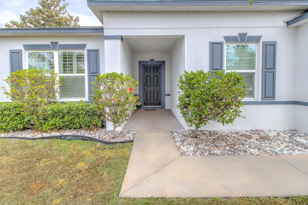 Photo of 6033 NW Relief Court, Port Saint Lucie, FL 34983 (MLS # R10979648)