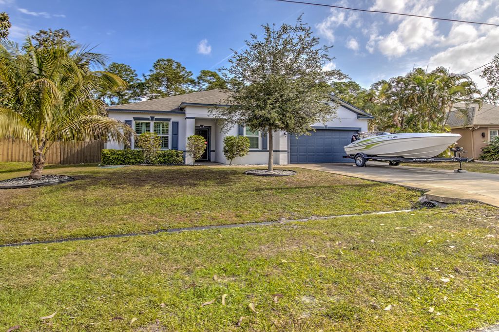 Photo of 6033 NW Relief Court, Port Saint Lucie, FL 34983 (MLS # R10979648)