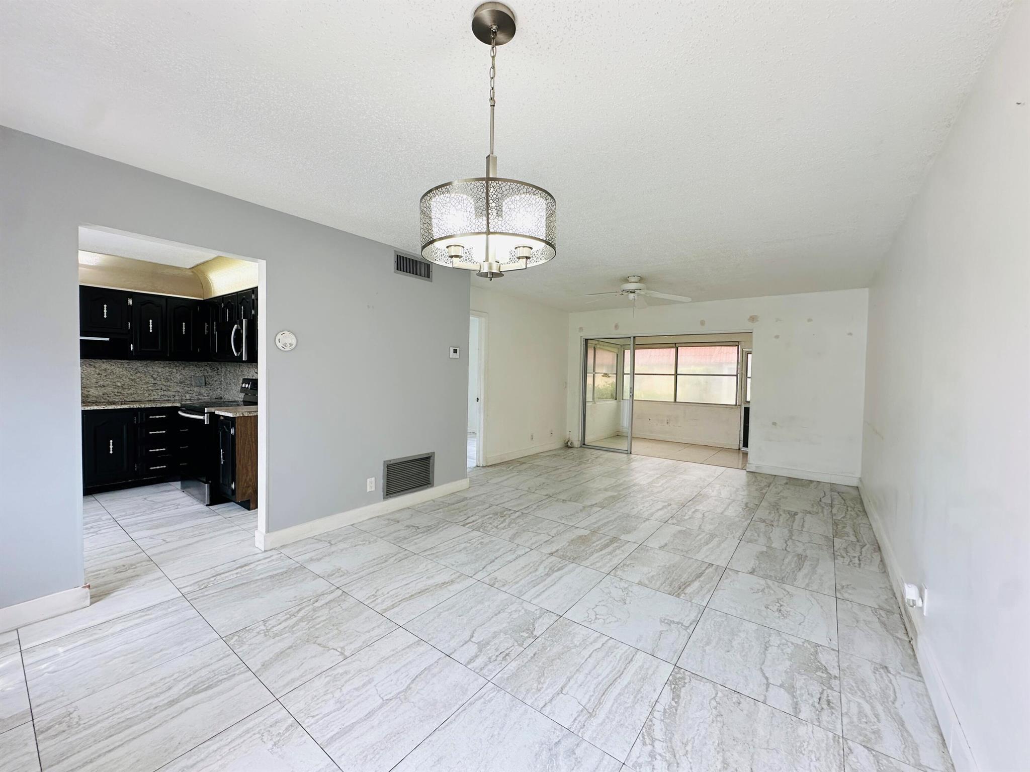 Best deal in the neighborhood! This 1-bedroom, 1-bath condo offers an open and airy layout with tile flooring throughout. The updated bathroom adds a modern touch, while the rest of the space provides a blank canvas for your personal style--just needs a some TLC. Enjoy the opportunity to customize and make it your own. Conveniently located near shopping, dining, and major highways. Don't miss this chance to own the best-priced home in the community!