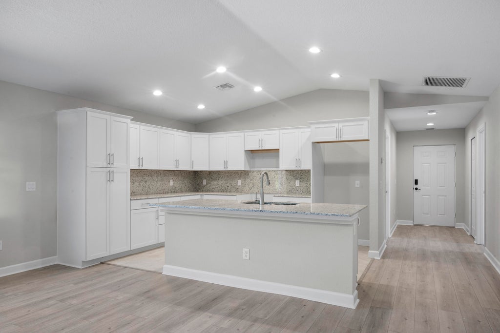 Photo of 63 Mediterranean Boulevard E, Port Saint Lucie, FL 34952 (MLS # B26073040)