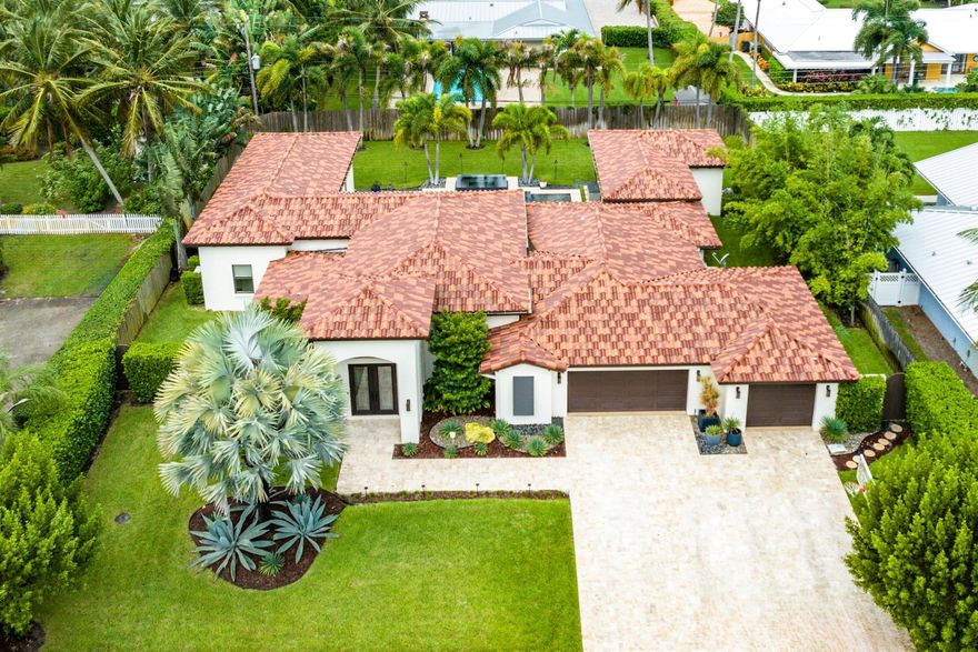 Impeccably built and designer decorated turnkey furnished home in the coveted Lake Ida neighborhood of Delray Beach. Completely rebuilt essentially new home offers all the highest quality finishes, fixtures, appliances and technology. Ranch style split floor plan. Sundrenched open living space with high ceilings and ceramic tile floors. Wolf cooktop and ovens. Sub-Zero refrigerator. Exposed wood beams and wood inlaid ceilings. Professionally furnished and decorated. Guest house. Summer kitchen. Modern pool. Expansive and lushly landscaped 16,576 square foot yard. And amazing sunsets with its Western exposure. Just minutes from top schools, Atlantic Avenue and the beach. Sold turnkey furnished. Just pack your suitcases. Even the golf cart will convey. Live the Floridian dream lifestyle!