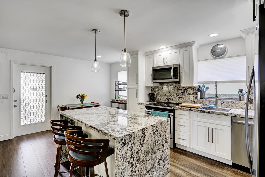 Photo of 100 Saxony C, Delray Beach, FL 33446 (MLS # R11055786)