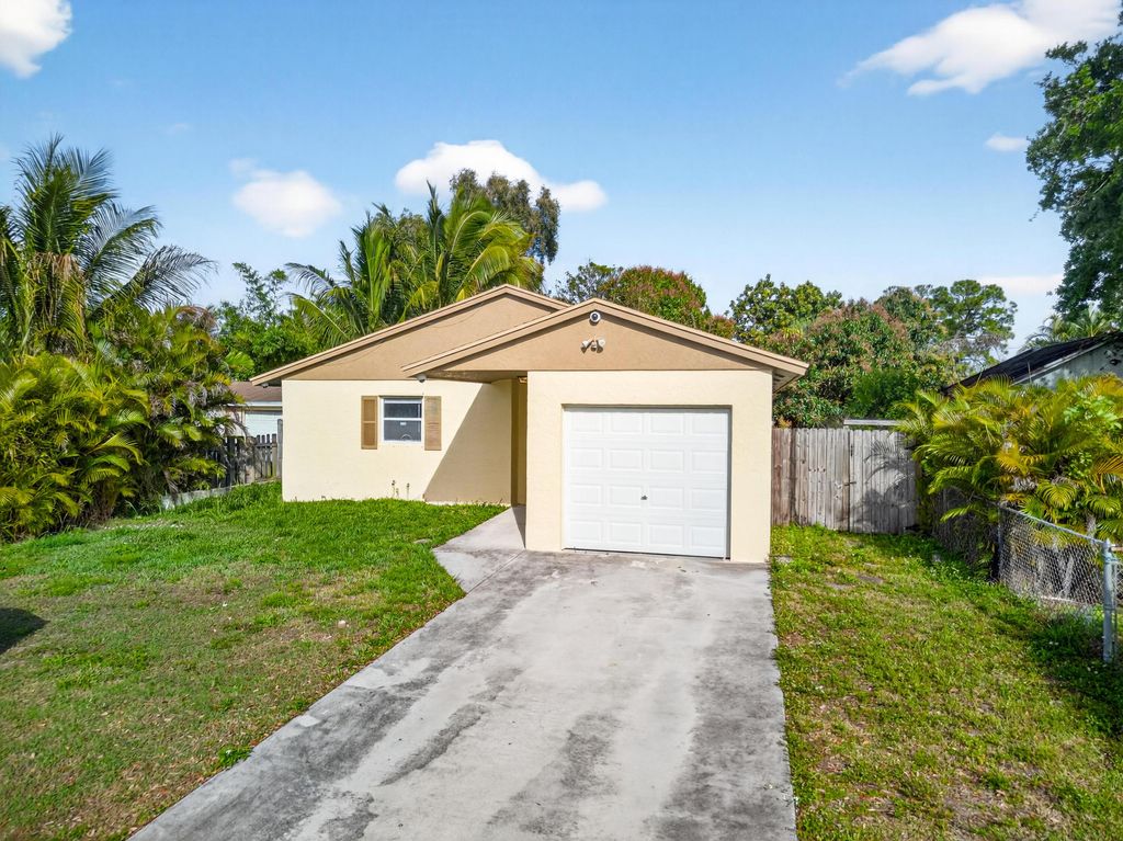 Photo of 328 Jennings Avenue, Greenacres, FL 33463 (MLS # B26006159)