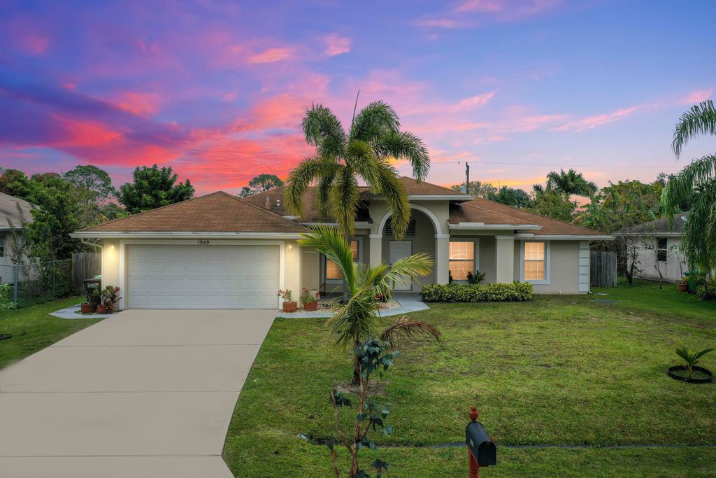 Photo of 1949 SW Flower Lane, Port Saint Lucie, FL 34953 (MLS # R10772129)