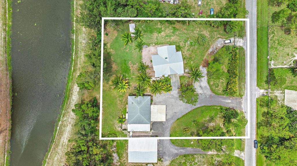 Photo of 12566 61st Street N, Loxahatchee, FL 33470 (MLS # R10995981)