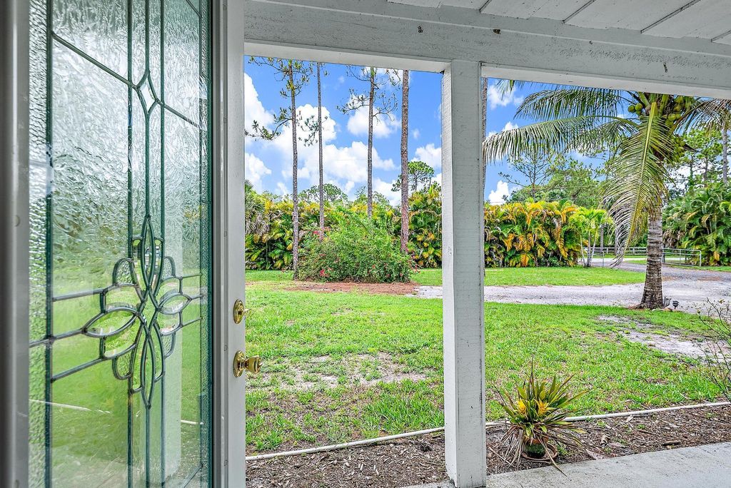 Photo of 12566 61st Street N, Loxahatchee, FL 33470 (MLS # R10995981)