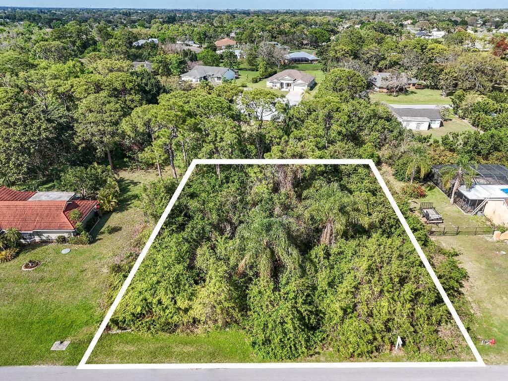 Photo of 1841 SE Beving Avenue, Port Saint Lucie, FL 34952 (MLS # R11064063)