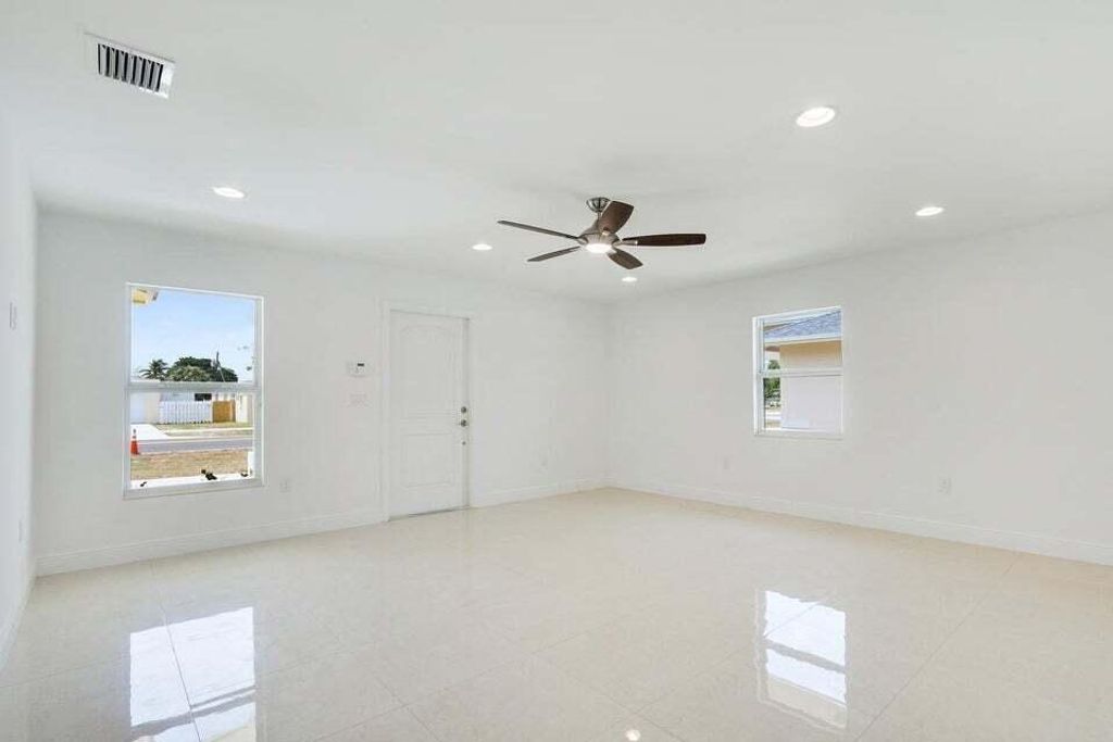 Photo of 121 Swain Boulevard, Greenacres, FL 33463 (MLS # R11161817)