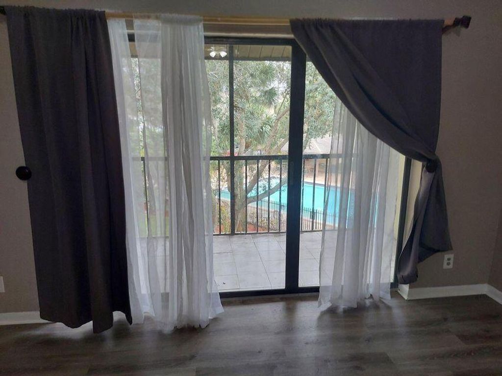 Photo of 202 Foxtail Drive #F3, Greenacres, FL 33415 (MLS # B26020378)