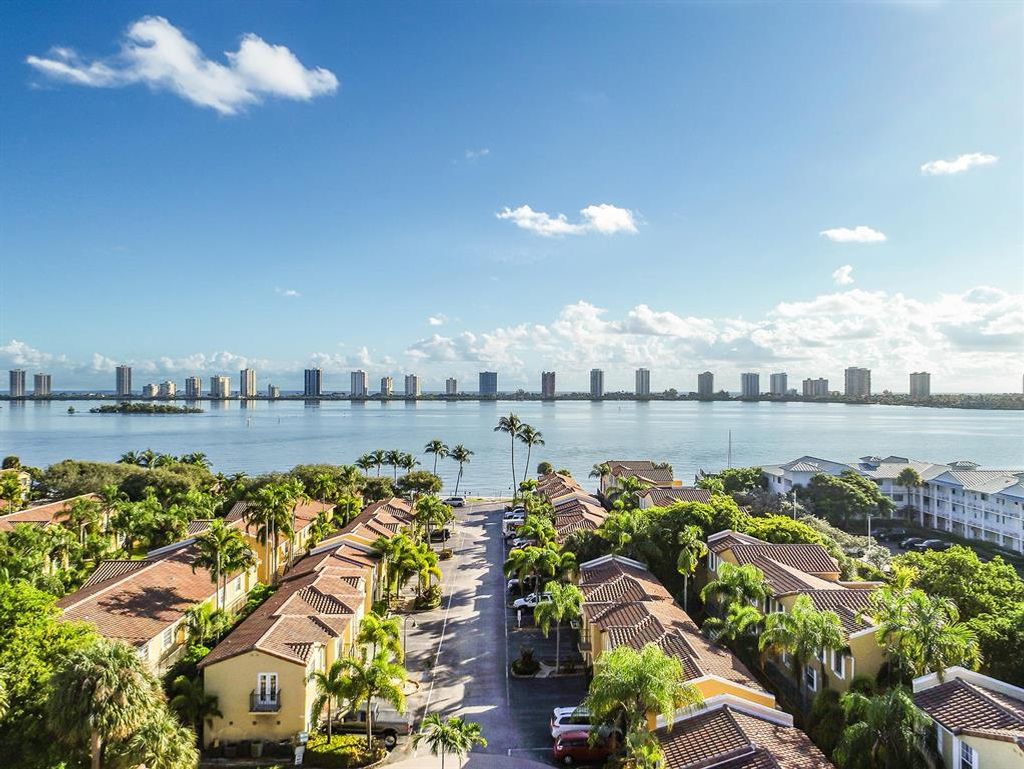 Photo of 1030 Lake Shore Drive #202, Lake Park, FL 33403 (MLS # R10718123)