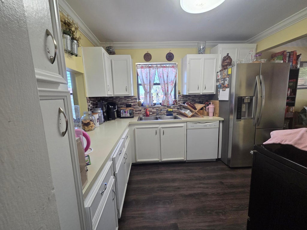 Photo of 5975 Forest Hill Boulevard, West Palm Beach, FL 33415 (MLS # B26038236)