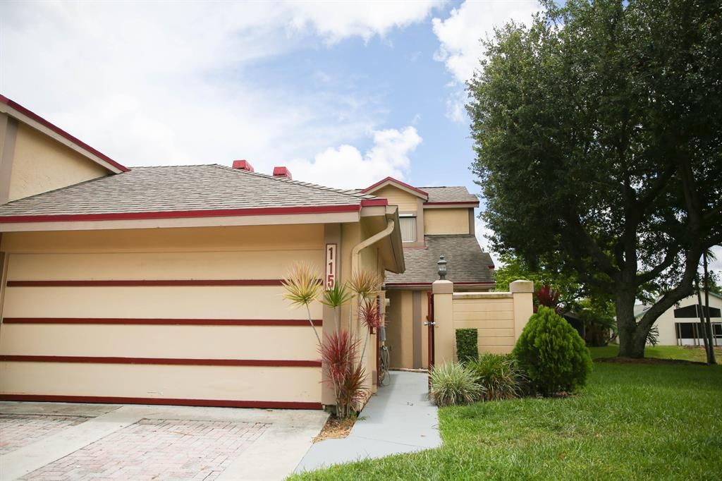 Photo of 115 Landings Boulevard Blvd, Green Acres, FL 33413 (MLS # R10721054)