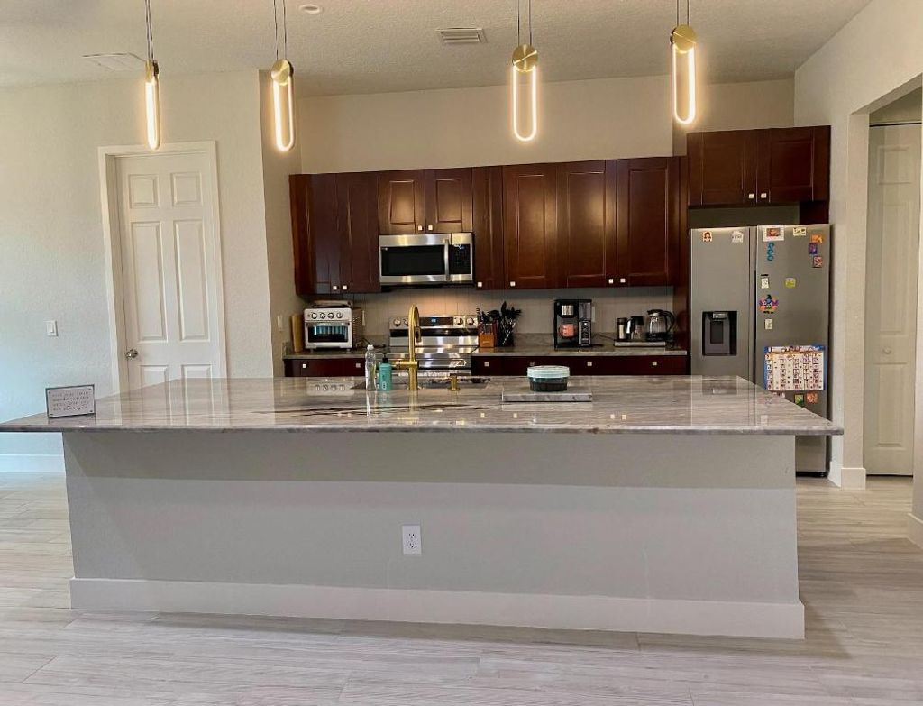 Photo of 3310 SW Savona Boulevard, Port Saint Lucie, FL 34953 (MLS # R10940396)