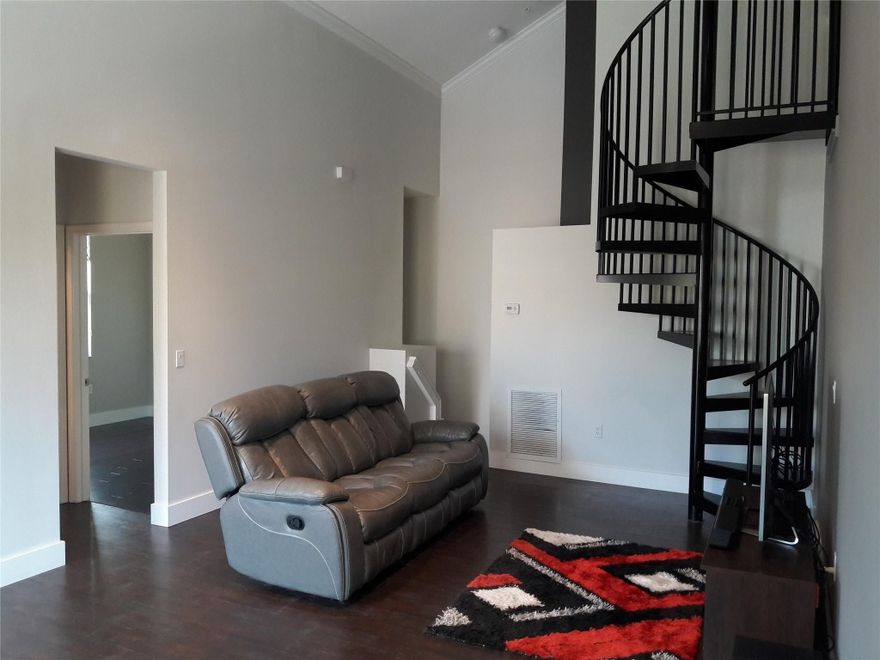 Experience luxury resort living in this marvelous, airy 2BR+Loft/2BA townhouse. Dramatic spiral stairs take you up to the spacious den. Enjoy the beautiful blend of dark porcelain tile (living area), and bamboo wood flooring(bedrooms/stairways). The well-equipped kitchen boasts cherry cabinets, granite counter tops and a gorgeous marble back-splash. Impact windows throughout! Superb amenities such as tranquil pools, sports courts & gym will become part of your life! Walk to Sawgrass Mall & Amarant Bank Arena (Home of the NHL Florida Panthers hockey club)!