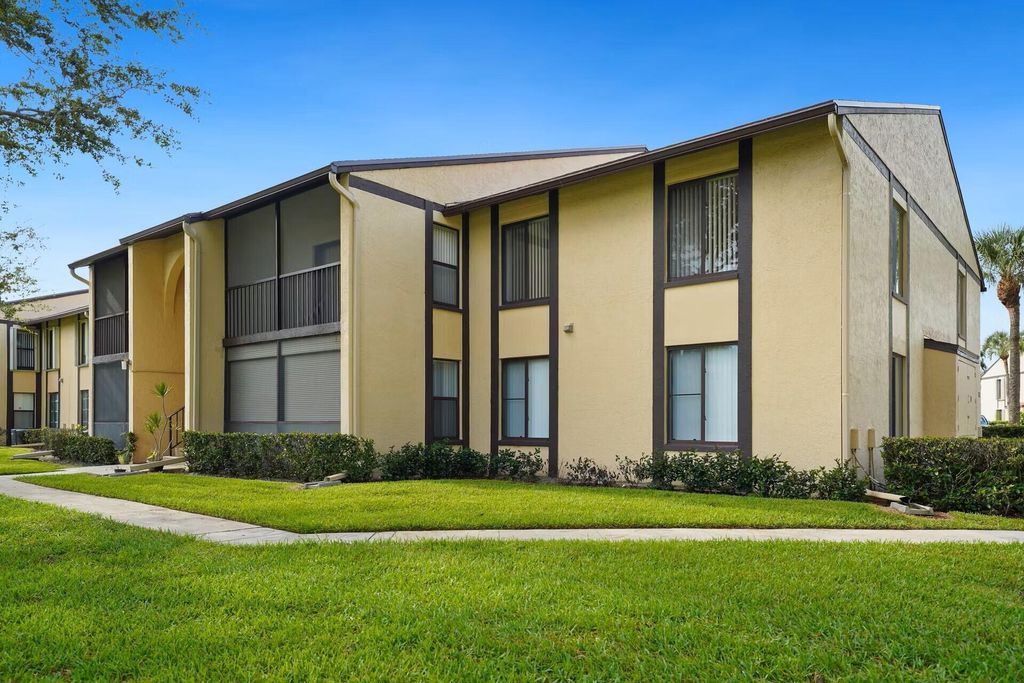 Photo of 802 Sky Pine Way #F2, Greenacres, FL 33415 (MLS # B26035377)