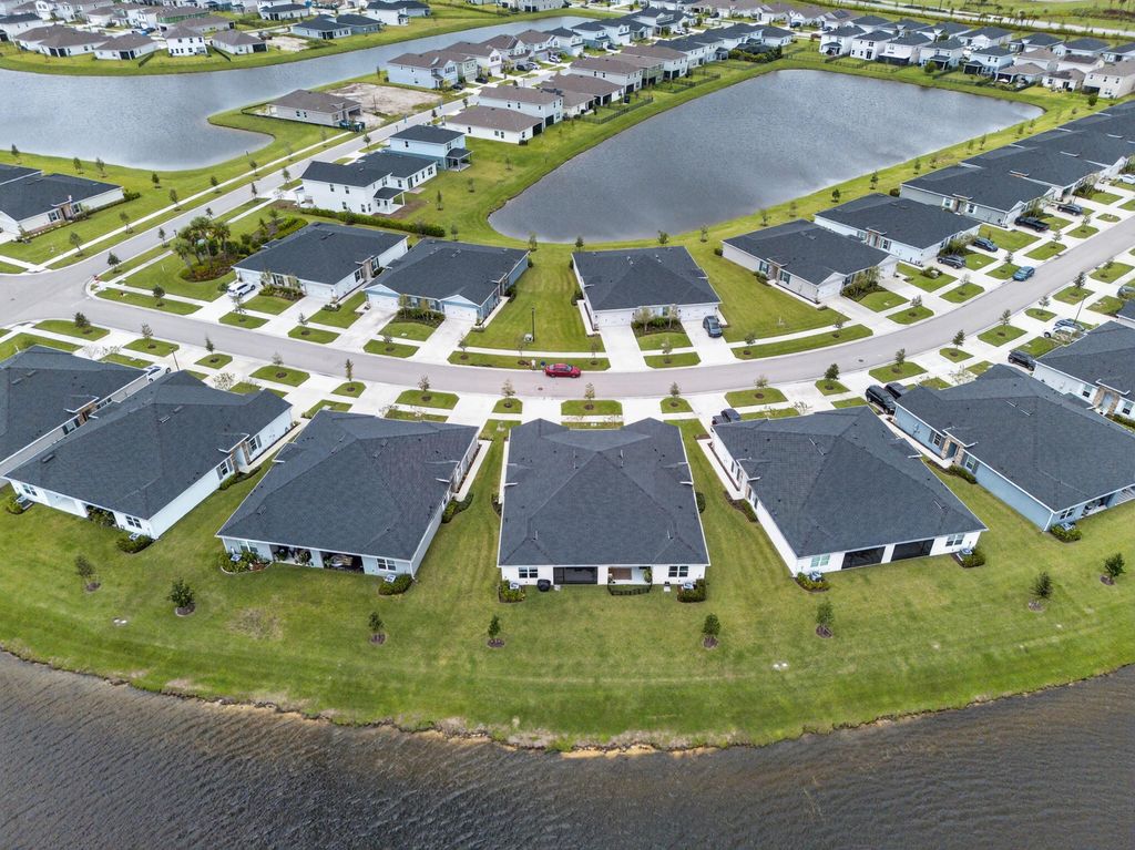 Photo of 9473 SW Libertas Way, Port Saint Lucie, FL 34987 (MLS # B26001282)