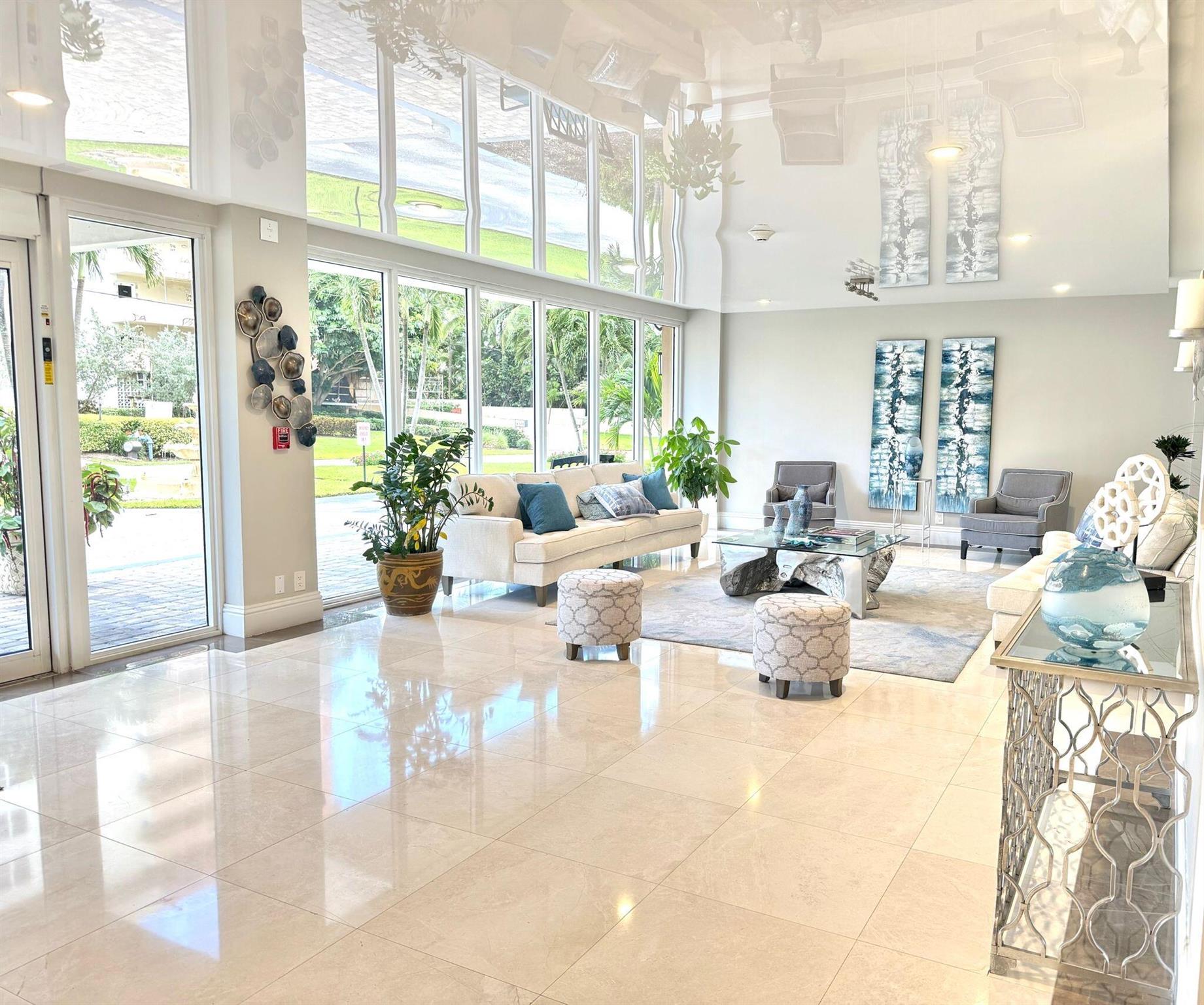 Stunning 2-bedroom, 2-bath apartment with direct Intracoastal views from every room and spectacular sunsets from your private balcony. Bright and spacious, it features a renovated modern kitchen, new impact windows and sliding door (2025), A/C (2021), fresh white interiors, covered parking with ceiling for protection, same-floor laundry, and abundant storage. Just steps from the elevator. Building upgrades include a new roof (2023), renovated lobby, modern hallways, fire sprinkler system, and balconies currently being updated. Amenities: heated Intracoastal-front pool, BBQ area, gym, billiards, community room, management, and 24/7 security. Safe, family-oriented, no Airbnb. Enjoy private beach access across the street plus proximity to Deerfield Pier, dining, and shops.