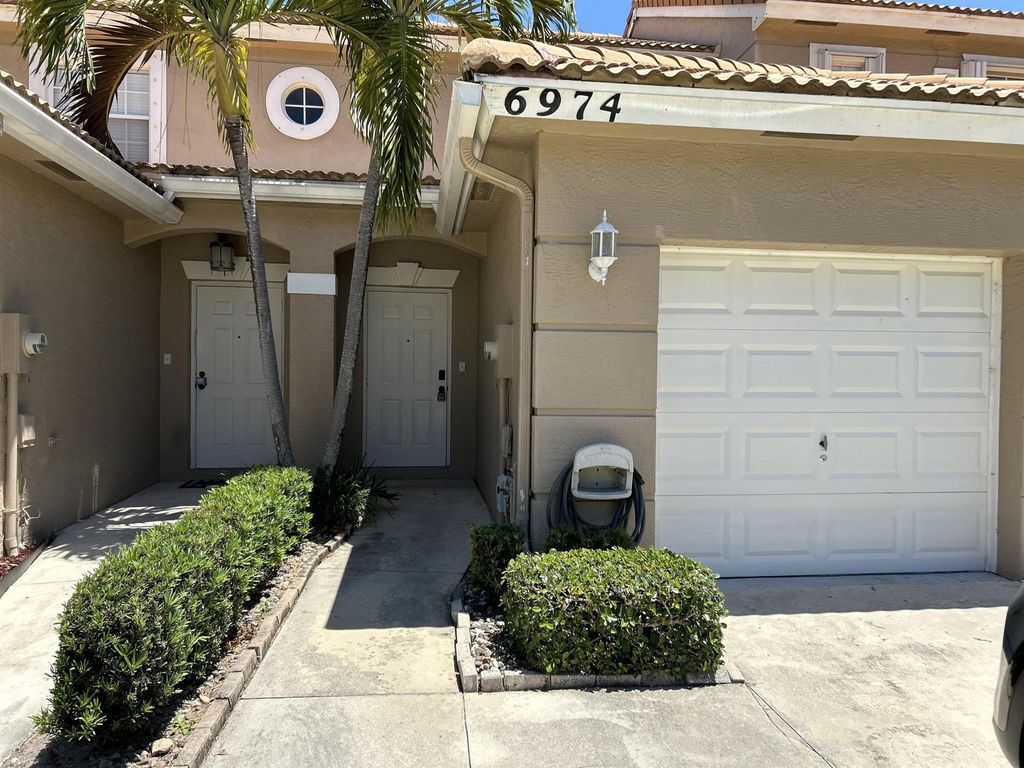 Photo of 6974 Oak Bridge Lane, Lake Worth, FL 33467 (MLS # R10948652)