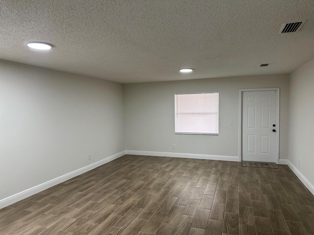 Photo of 496 E Jordan Boulevard, Pahokee, FL 33476 (MLS # R11097630)