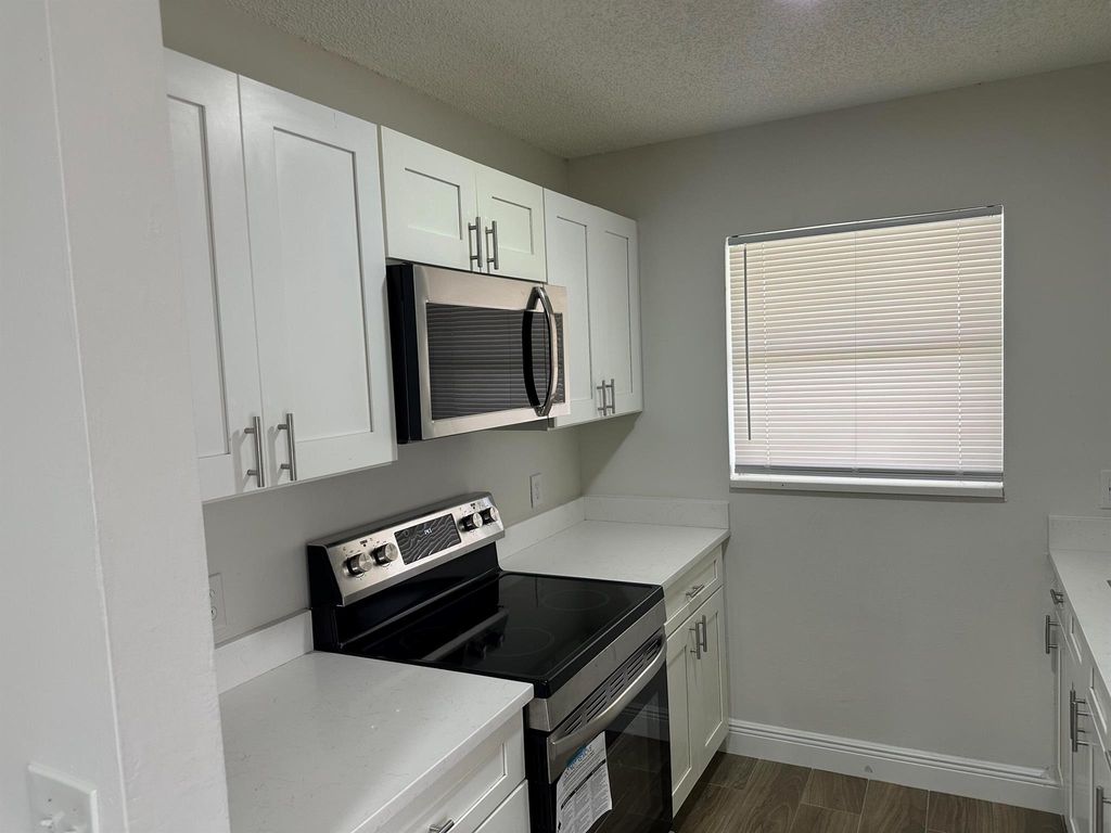 Photo of 496 E Jordan Boulevard, Pahokee, FL 33476 (MLS # R11097630)