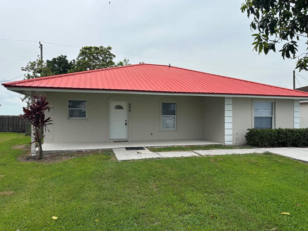 Photo of 496 E Jordan Boulevard, Pahokee, FL 33476 (MLS # R11097630)