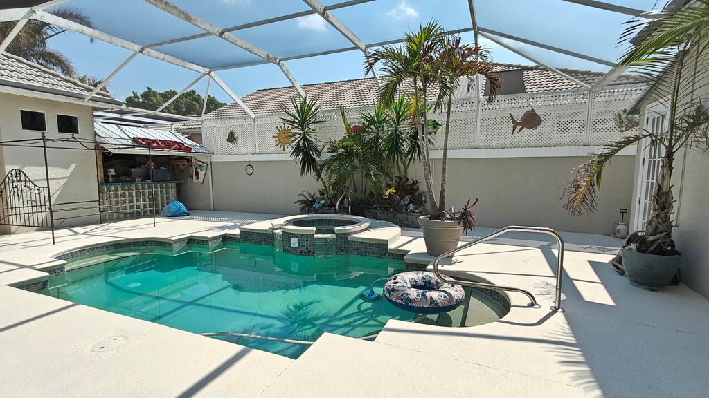 Photo of 588 SW Saint Johns Bay, Port Saint Lucie, FL 34986 (MLS # R11165849)